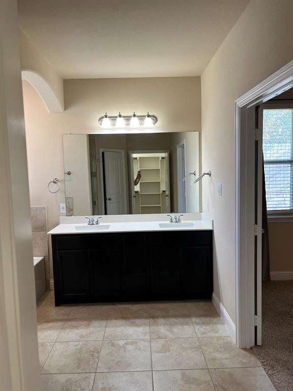 8 Pleasant Valley Sanger, TX 76266 - Photo 10 of 26 a view of room with a mirror and a sink