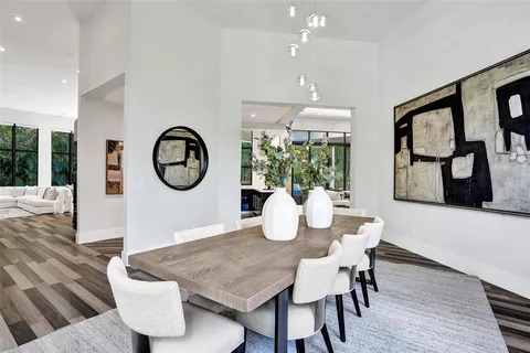 a bedroom with a large bed and a couch