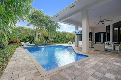 a kitchen with a refrigerator stove and cabinets