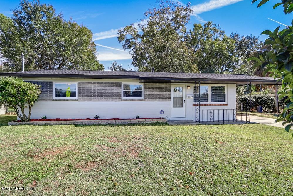 4427 Barnes Road South Jacksonville, FL 32207 - Photo 3 of 39 a view of a house with backyard and garden