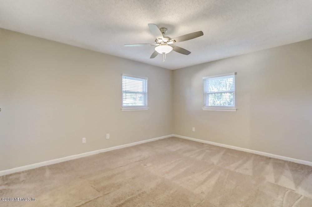 4427 Barnes Road South Jacksonville, FL 32207 - Photo 33 of 39 a view of an empty room with a window