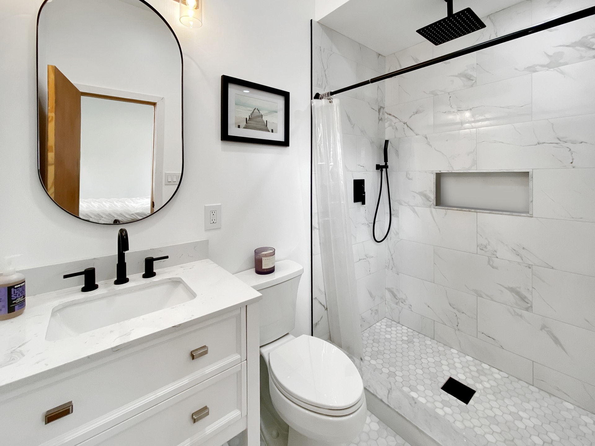 18 Old Riverhead Road East Hampton Bays, NY 11946 - Photo 7 of 15 a bathroom with a sink toilet and shower