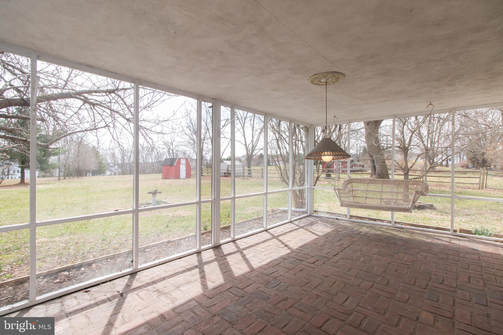 1059 Upper State Road Chalfont, PA 18914 - Photo 22 of 27 Screened in Back Porch