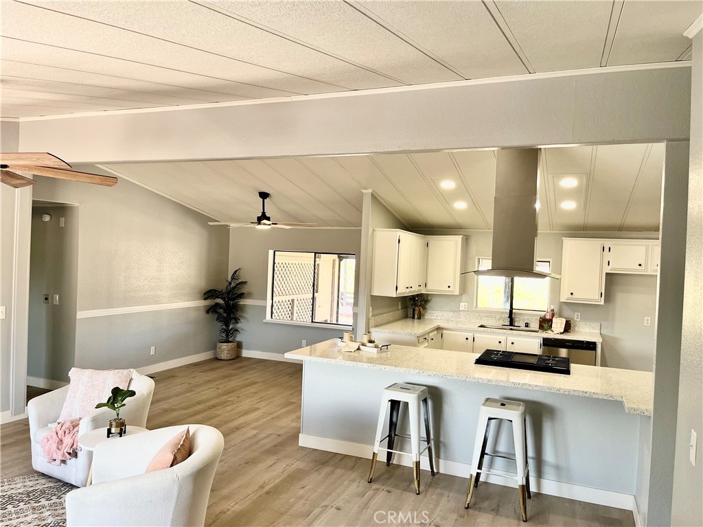 16336 Yuma Road Apple Valley, CA 92307 - Photo 3 of 18 a kitchen with a dining table chairs and window