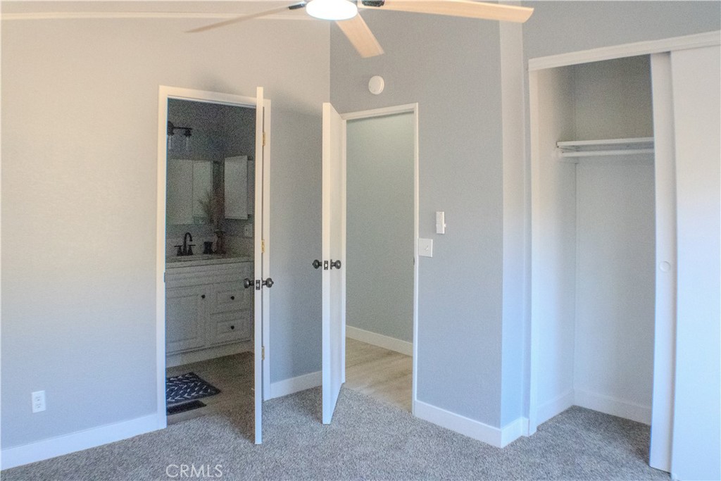 16336 Yuma Road Apple Valley, CA 92307 - Photo 9 of 18 a view of a bathroom with mirror
