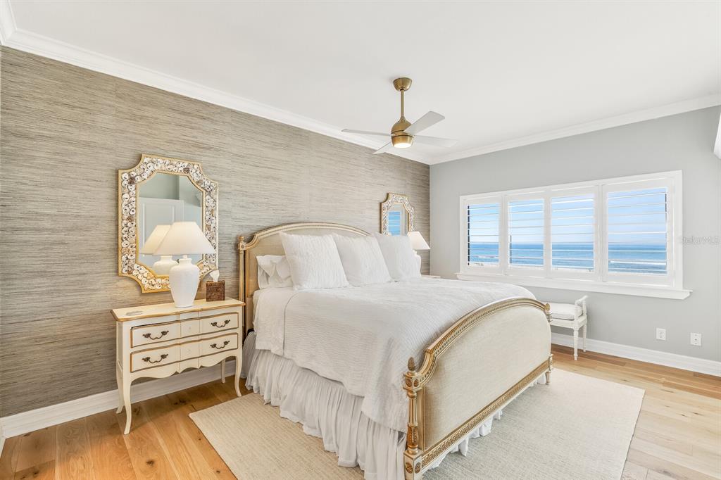 5000 Gasparilla Road, Unit 29A Boca Grande, FL 33921 - Photo 14 of 40 a bedroom with a bed and a dresser