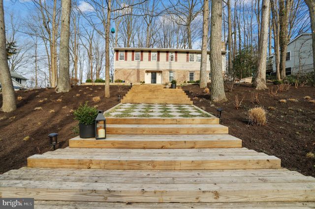 a view of a pathway of residential houses