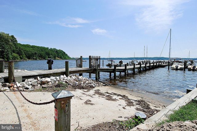 a view of swimming pool with chairs