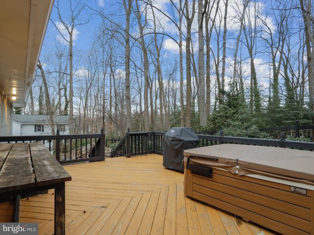 a view of a patio with two chairs and a table