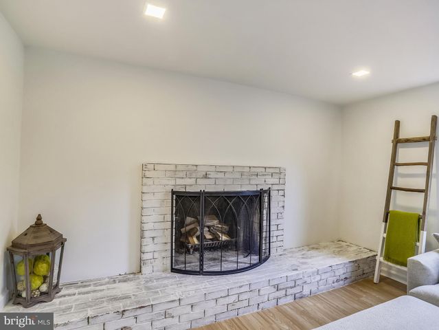 a living room with a fireplace