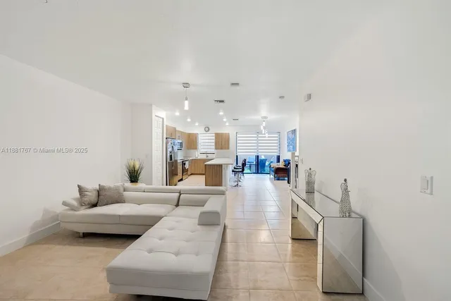 a living room with furniture and a table