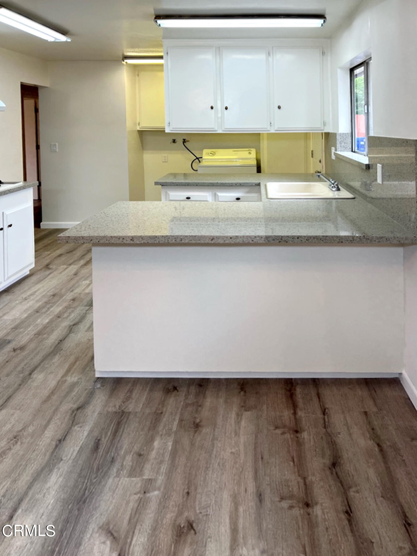 8747 Duarte Road San Gabriel, CA 91775 - Photo 5 of 13 a bathroom with a granite countertop sink