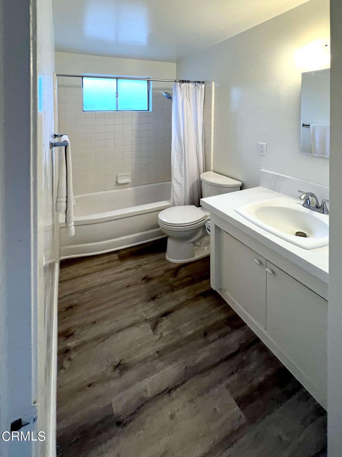 8747 Duarte Road San Gabriel, CA 91775 - Photo 8 of 13 a bathroom with a sink and mirror