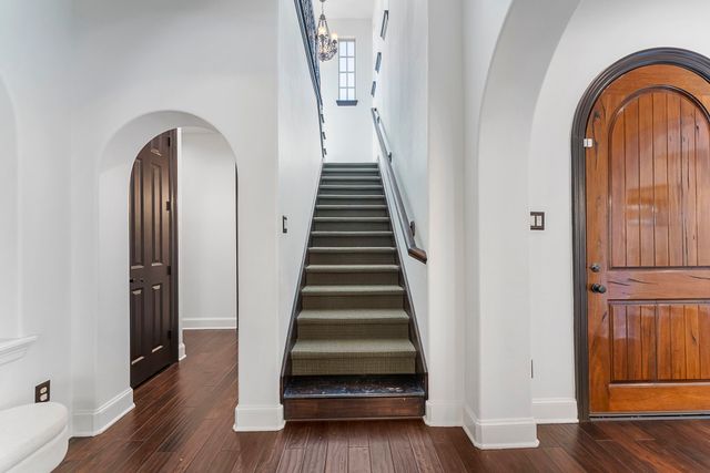 a view of entryway with wooden floor