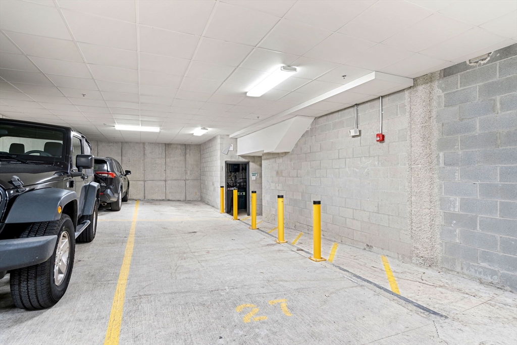 30 Polk Street, Unit 208 Boston, MA 02129 - Photo 26 of 30 a view of a room with gym equipment