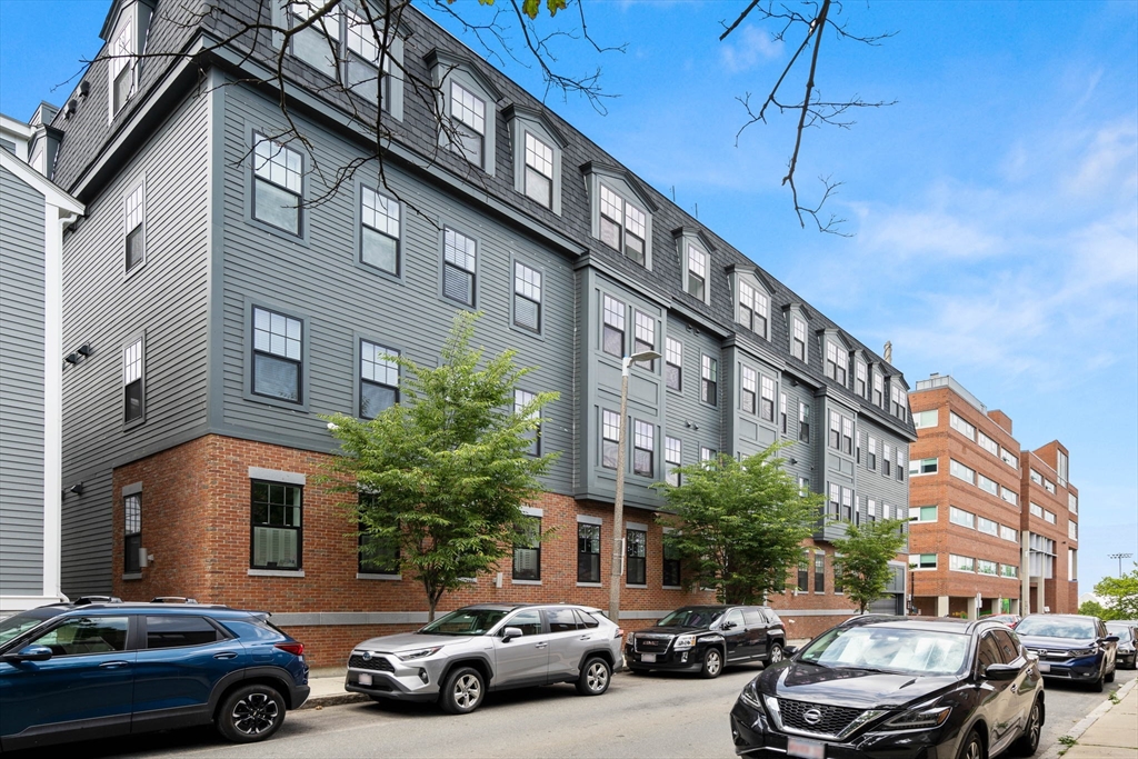 30 Polk Street, Unit 208 Boston, MA 02129 - Photo 28 of 30 a view of a car parked in front of a building