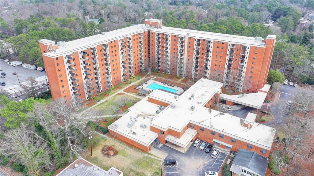 300 Johnson Ferry Road, Unit A112 Atlanta, GA 30328 - Photo 34 of 42 a view of a patio with wooden floor