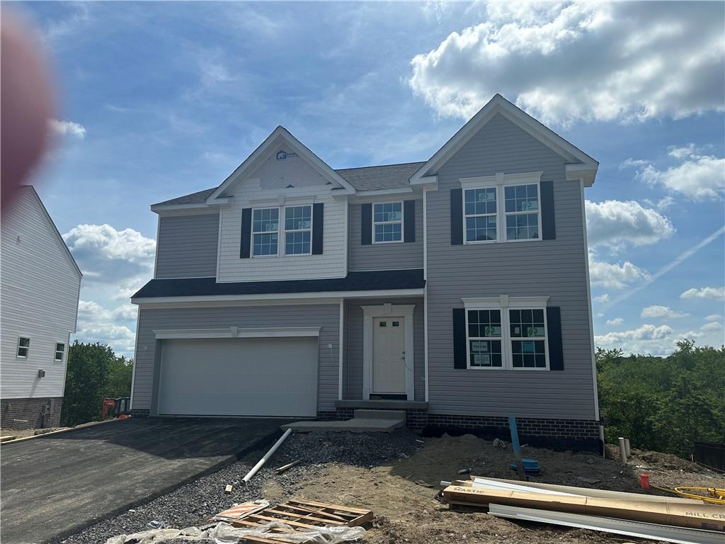 240 Rylie Drive Harmony, PA 16037 - Photo 2 of 2 a front view of a house with a yard
