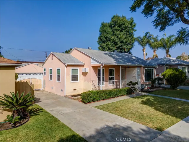 an aerial view of a house with a garden