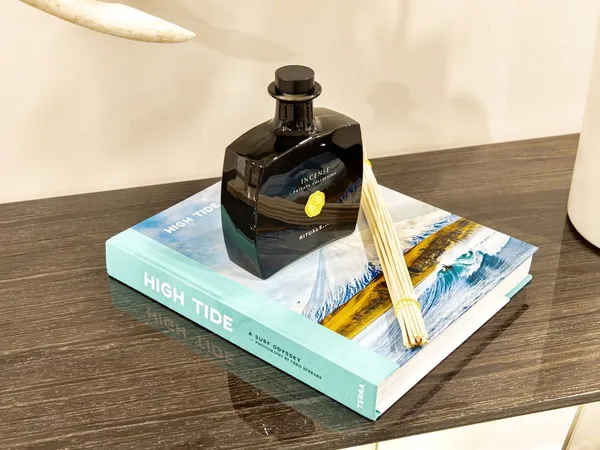 a kitchen with a refrigerator and a sink