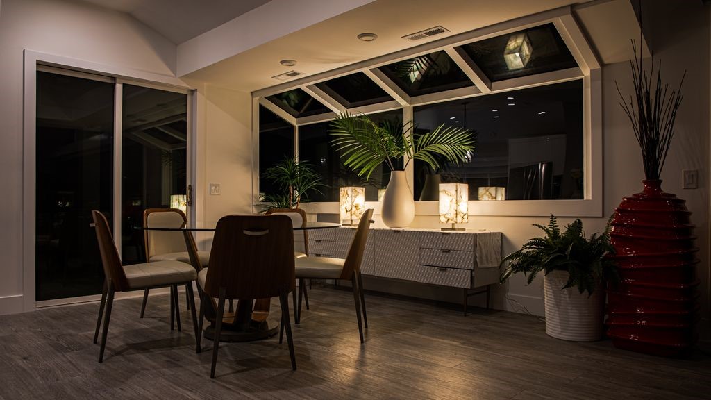 16 North Stonington Road Laguna Beach, CA 92651 - Photo 19 of 33 a view of dining room and wooden floor