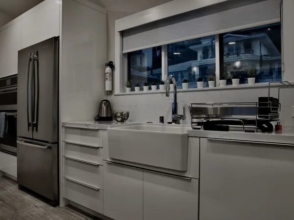 a kitchen with a sink and stove