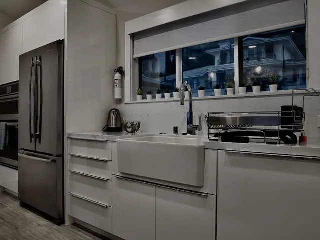 a kitchen with a sink and stove