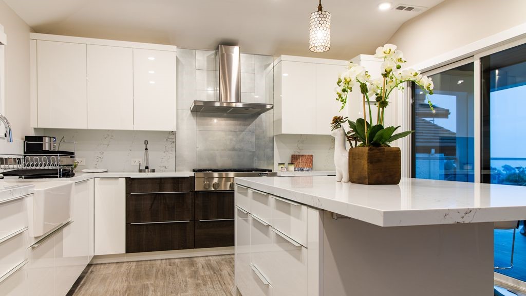 16 North Stonington Road Laguna Beach, CA 92651 - Photo 23 of 33 a kitchen with a sink and stove