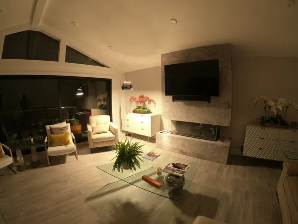 a view of a terrace with a table and chairs