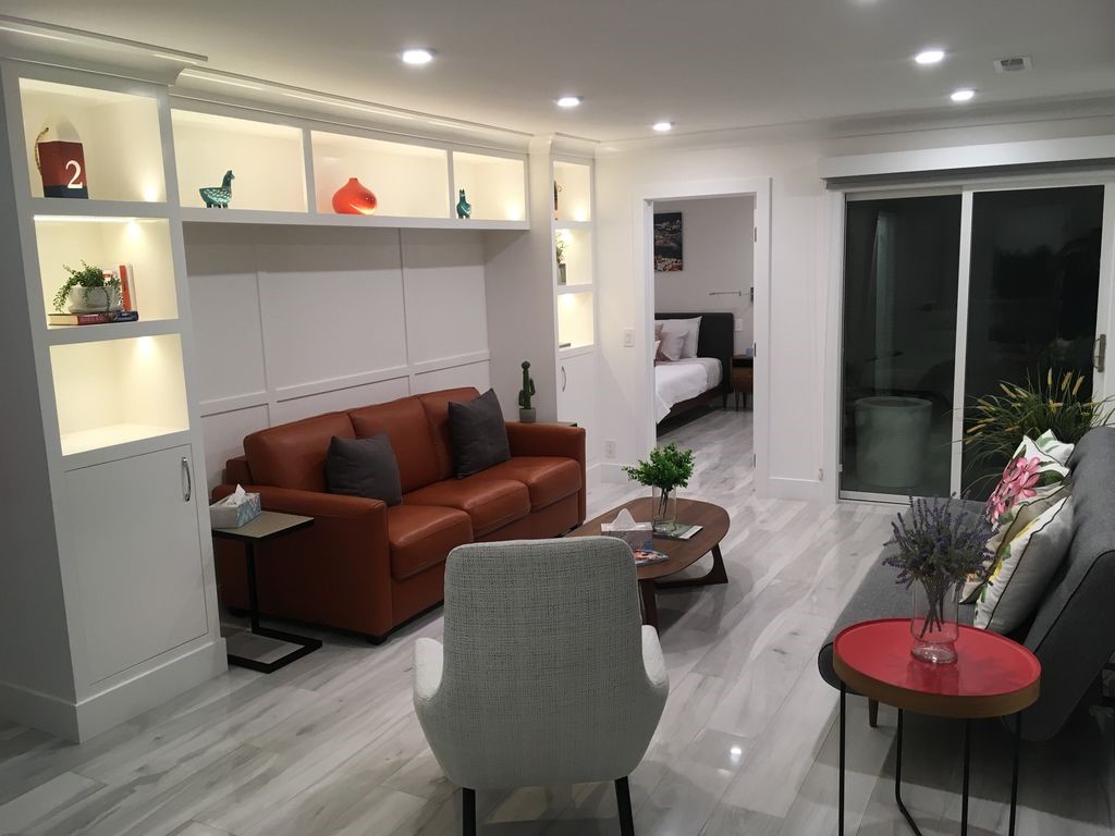16 North Stonington Road Laguna Beach, CA 92651 - Photo 26 of 33 a living room with furniture and a wooden floor