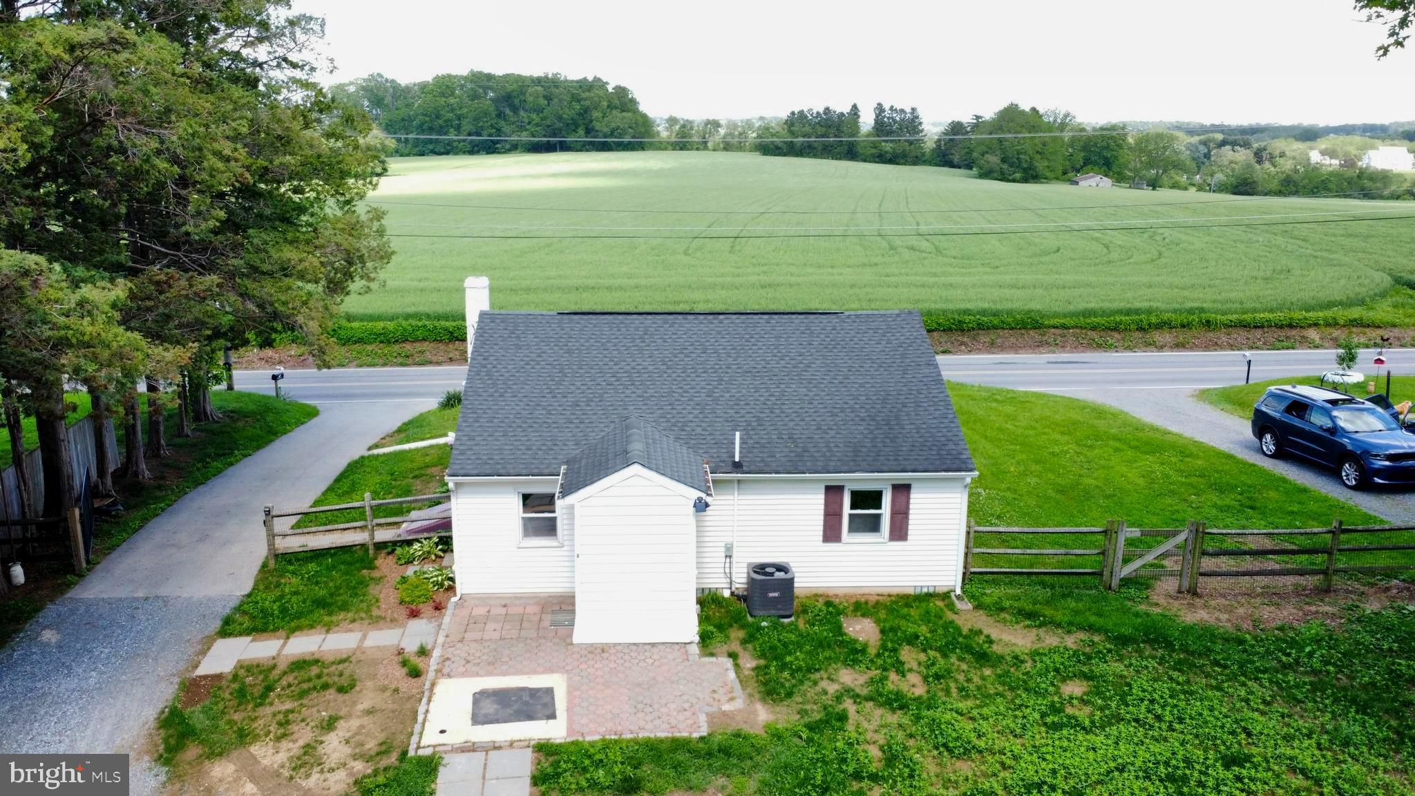 2896 Forge Road Nottingham, PA 19362 - Photo 5 of 21 an aerial view of a house with a garden and lake view