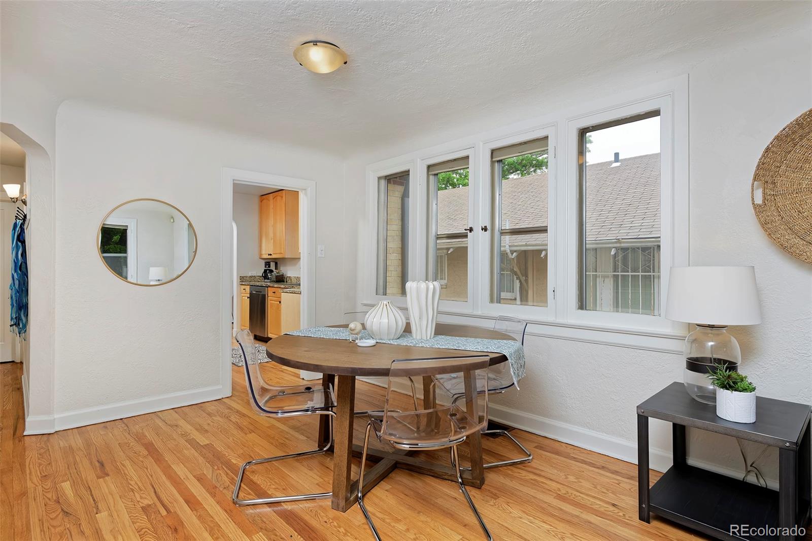 1674 Cherry Street Denver, CO 80220 - Photo 7 of 31 a view of a dining room with furniture and a window
