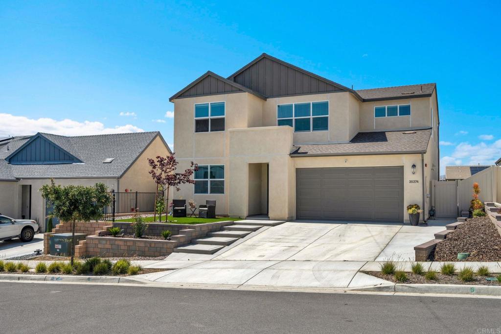 a front view of a house with entertaining space