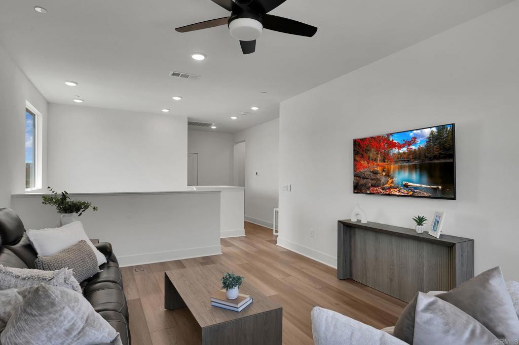 35374 Orchard Trail Fallbrook, CA 92028 - Photo 13 of 33 a living room with furniture and a flat screen tv