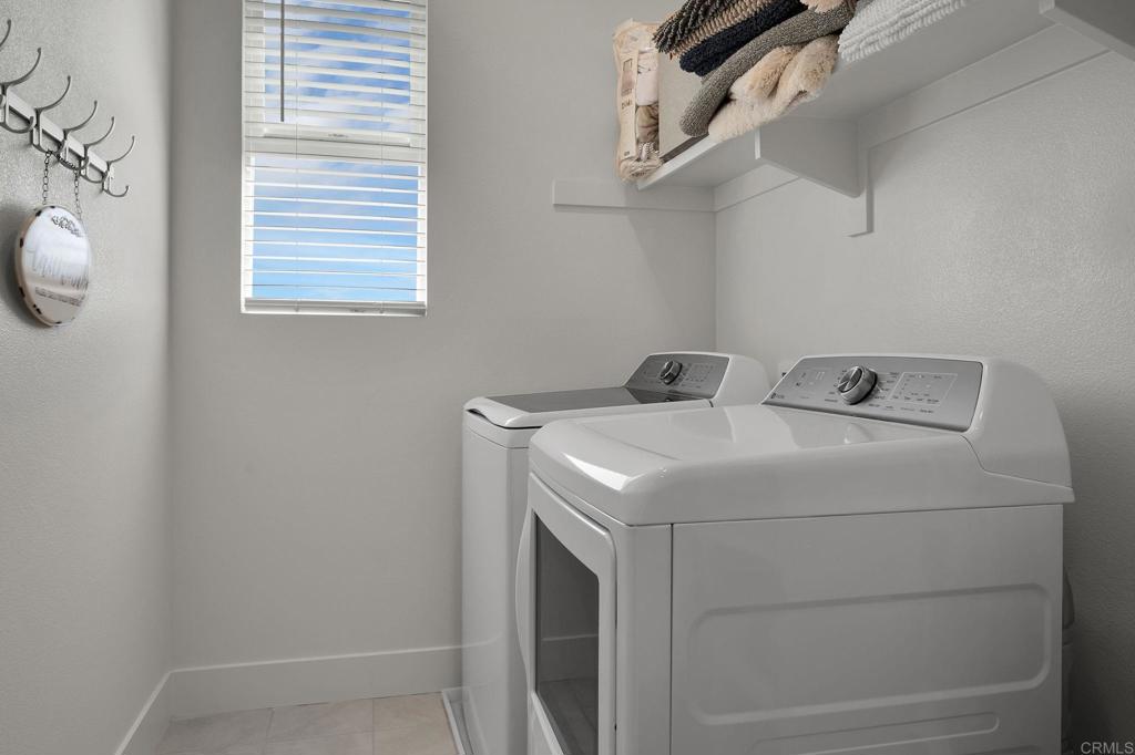 35374 Orchard Trail Fallbrook, CA 92028 - Photo 14 of 33 a utility room with dryer and washer