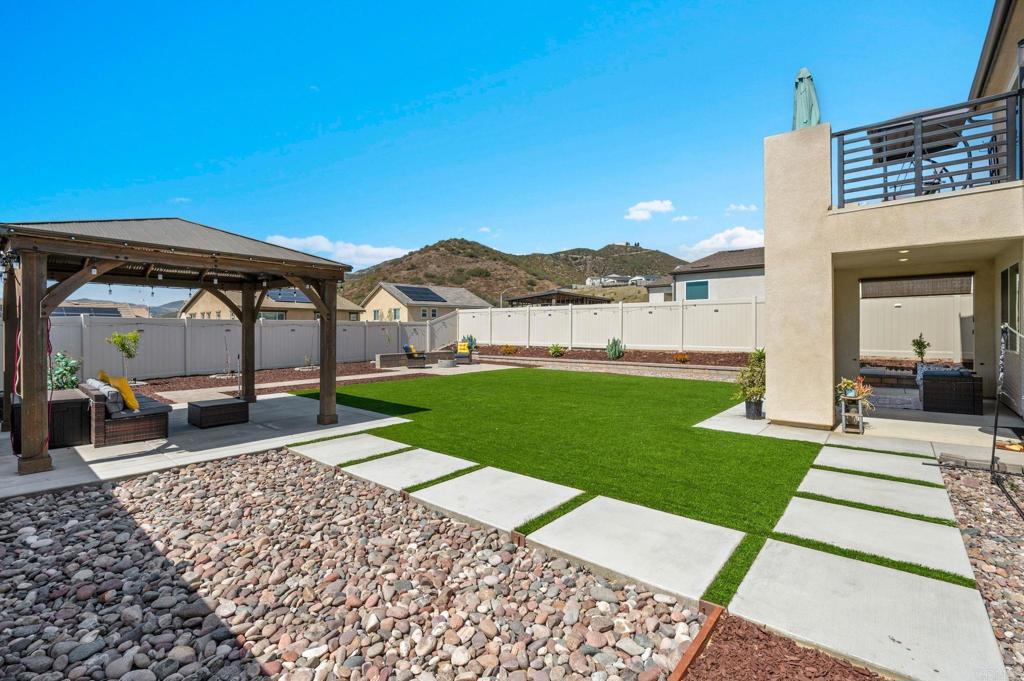 35374 Orchard Trail Fallbrook, CA 92028 - Photo 22 of 33 a view of a house with a yard