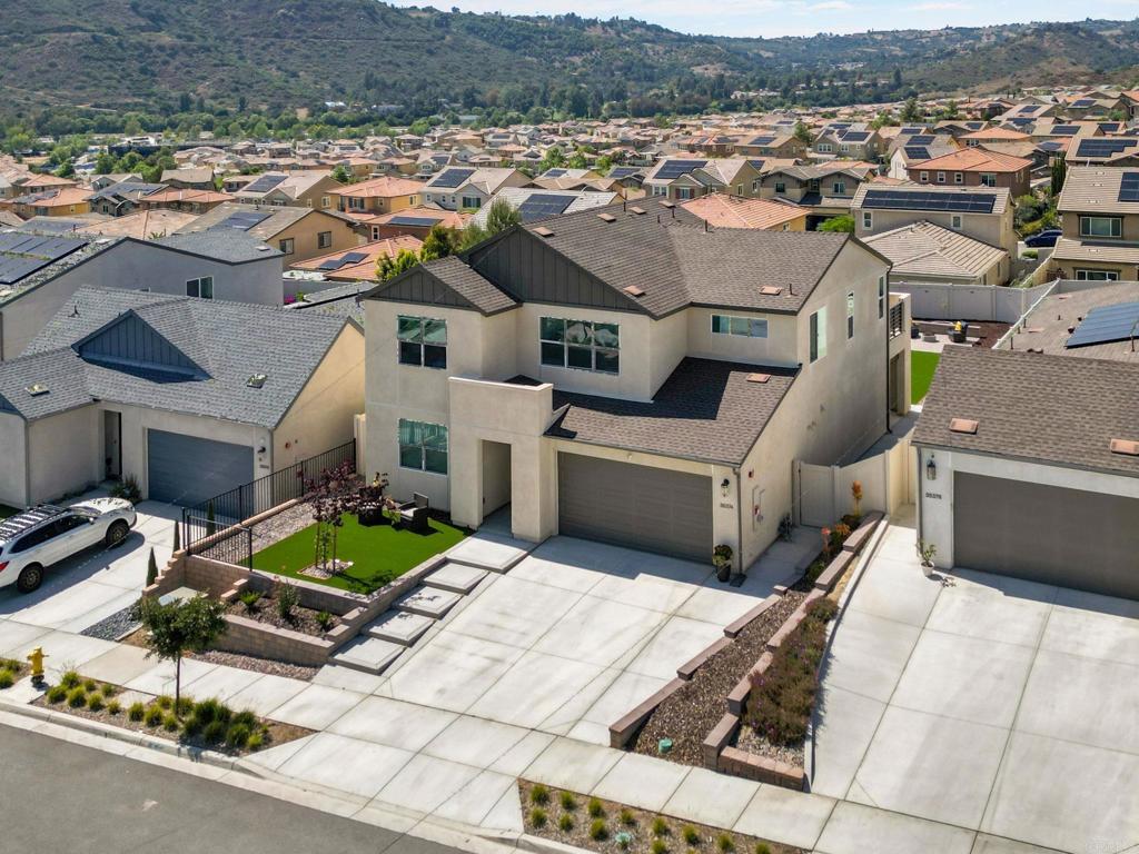 35374 Orchard Trail Fallbrook, CA 92028 - Photo 25 of 33 an aerial view of a house with yard garage and mountain view in back