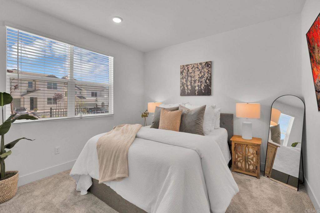35374 Orchard Trail Fallbrook, CA 92028 - Photo 7 of 33 a bedroom with a bed and a large window