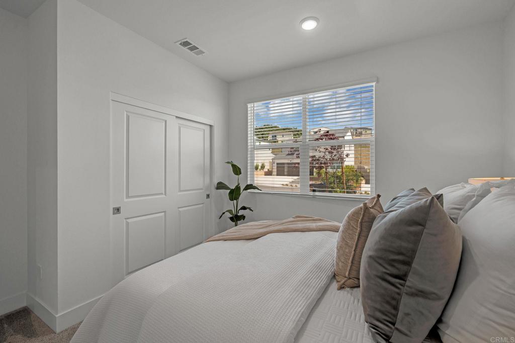 35374 Orchard Trail Fallbrook, CA 92028 - Photo 8 of 33 a bed sitting in a bedroom next to a window