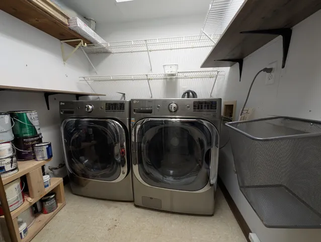 a utility room with dryer and washer