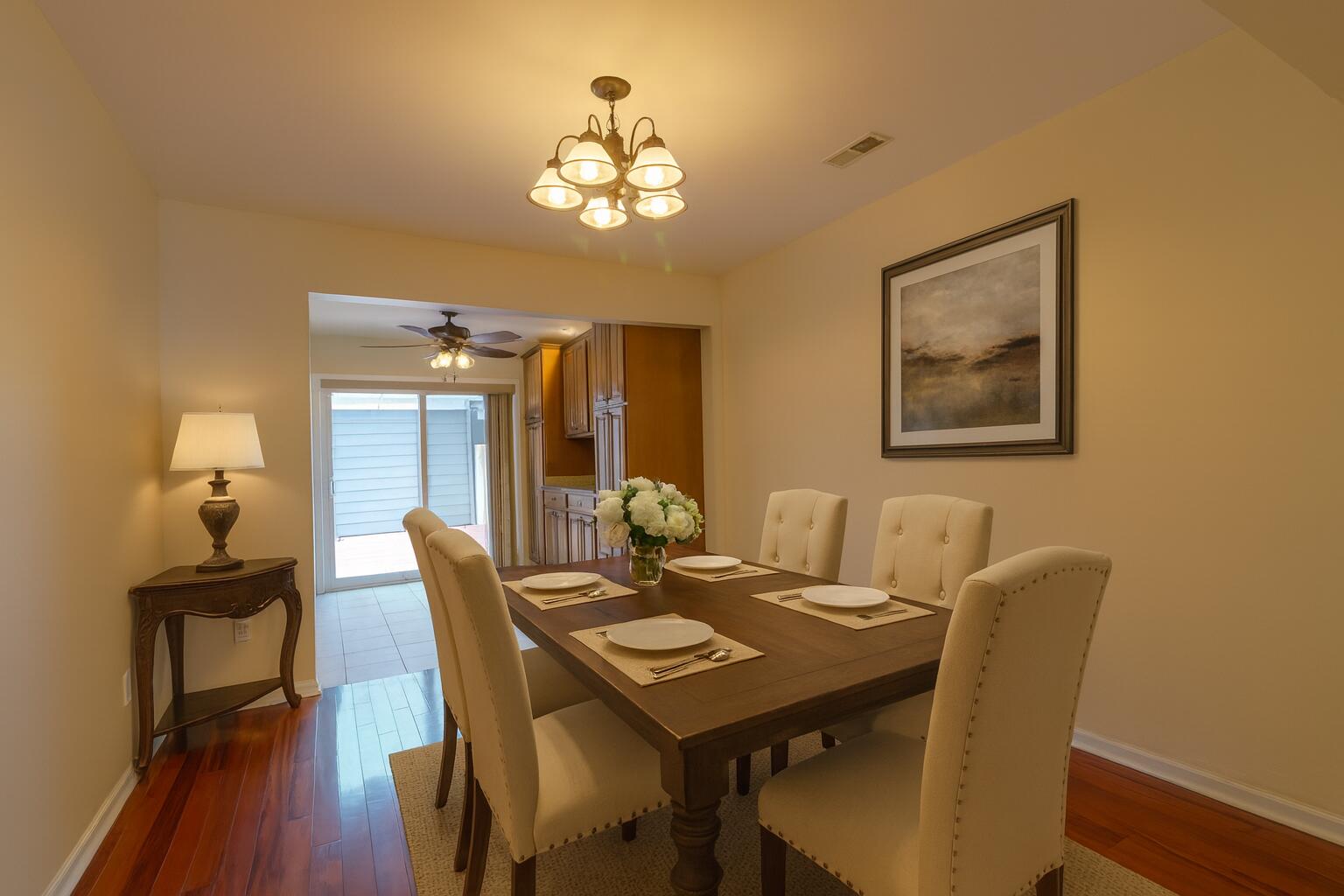 767 Kenmare Parkway Crown Point, IN 46307 - Photo 6 of 27 a view of a dining room with furniture and wooden floor