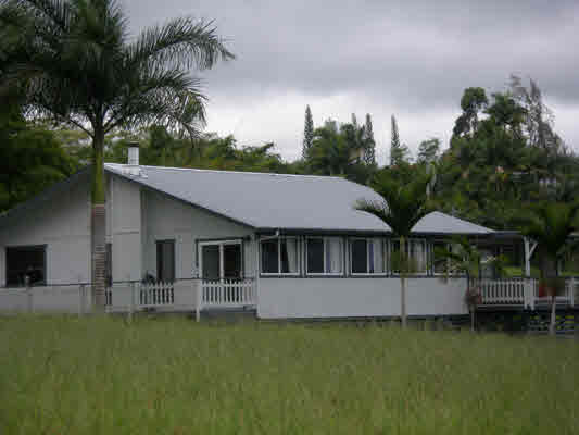 1939 Kaiwiki Road Hilo, HI 96720 - Photo 1 of 16 a front view of a house with garden