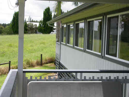 1939 Kaiwiki Road Hilo, HI 96720 - Photo 4 of 16 a view of a back yard from a balcony