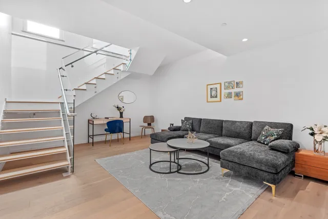 a bedroom with a bed and walk in closet