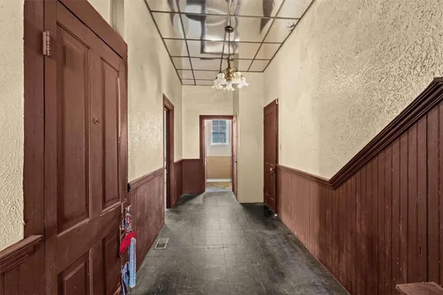 a bedroom with a bed and a fireplace