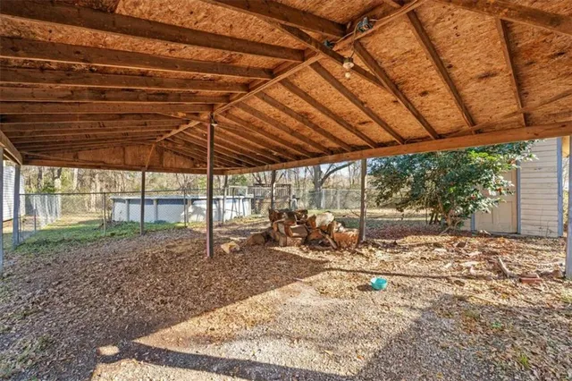 a backyard of a house with lots of green space