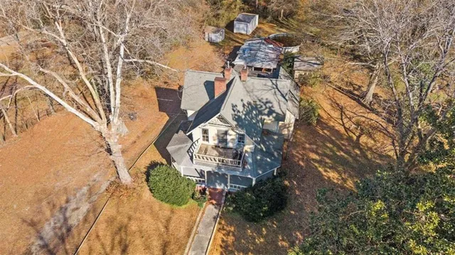a view of a balcony with wooden floor