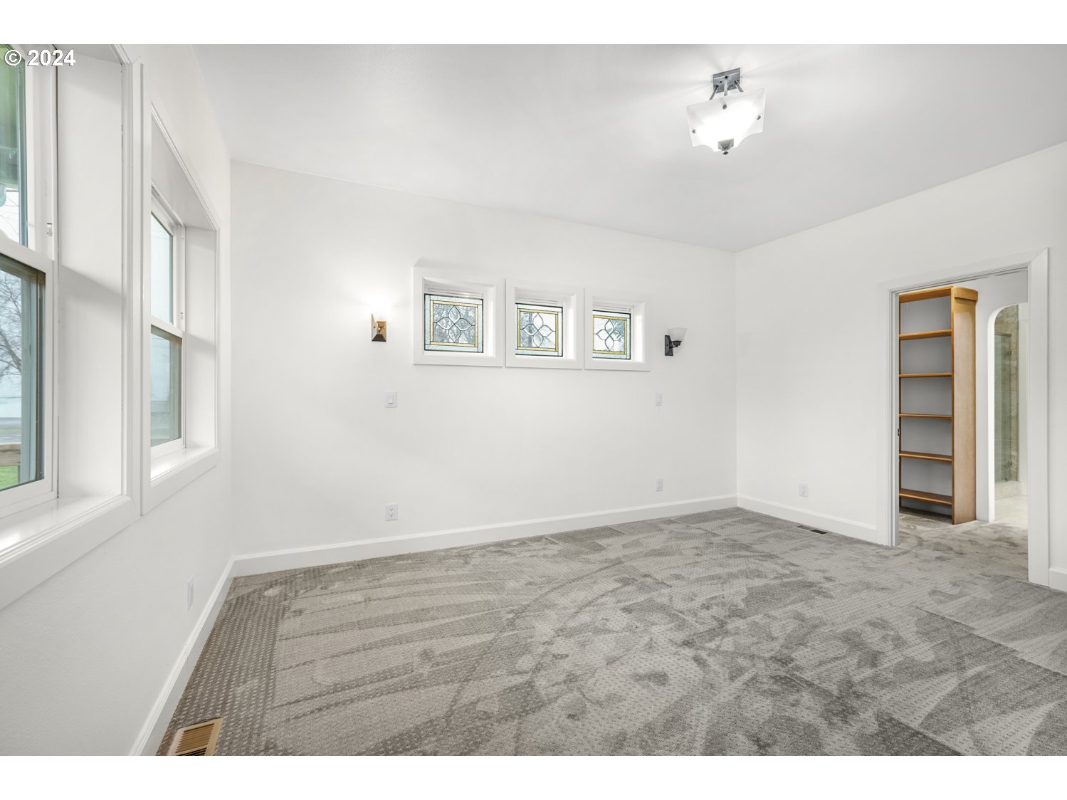 311 Washington Street Lyle, WA 98635 - Photo 11 of 29 a view of an empty room with a window