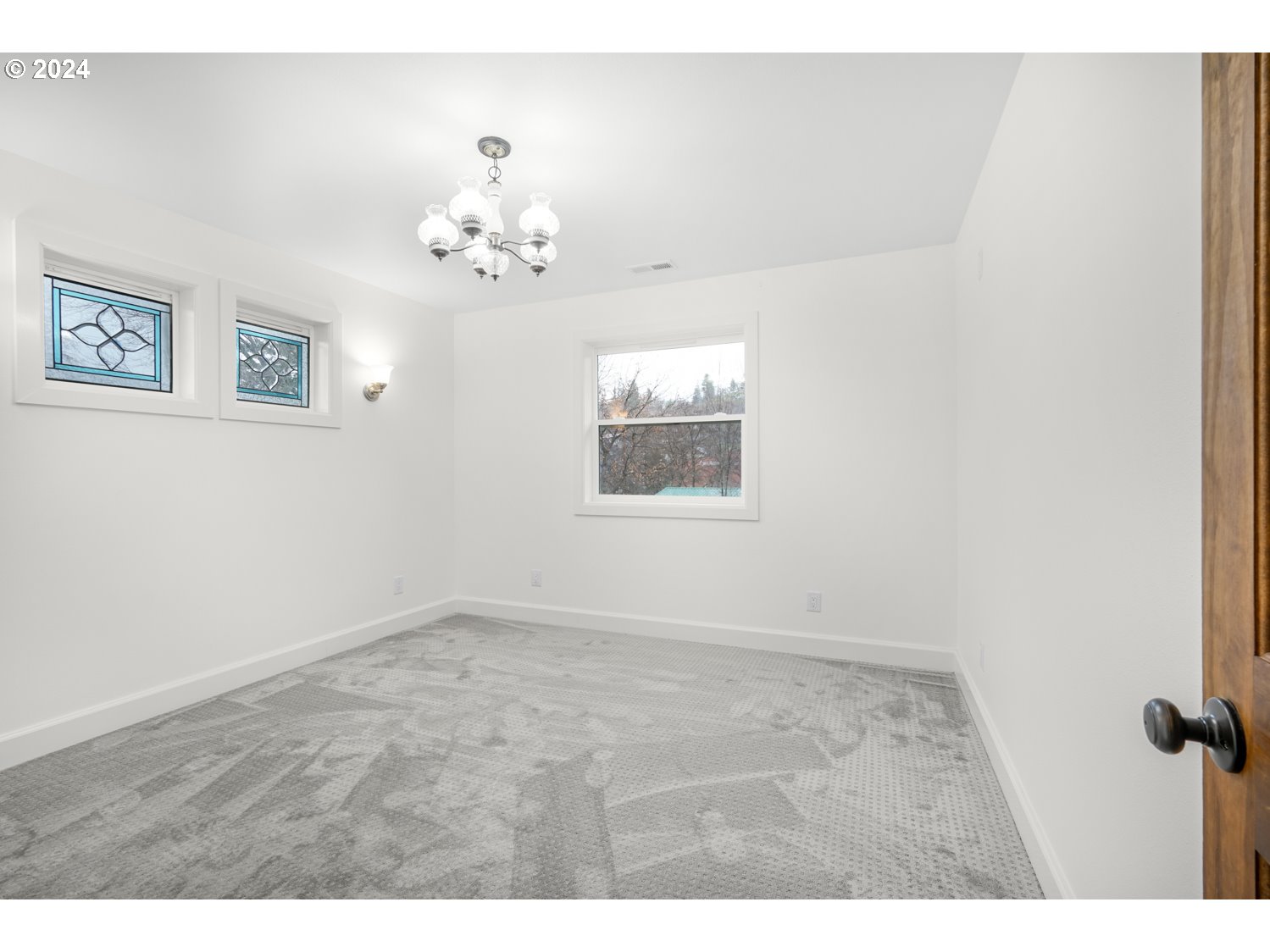 311 Washington Street Lyle, WA 98635 - Photo 22 of 29 a view of an empty room with a window