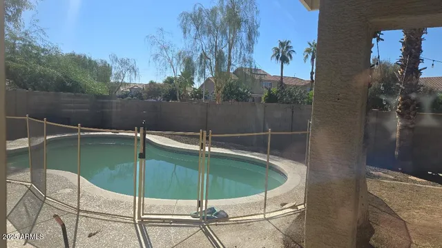a view of staircase with white walls and window